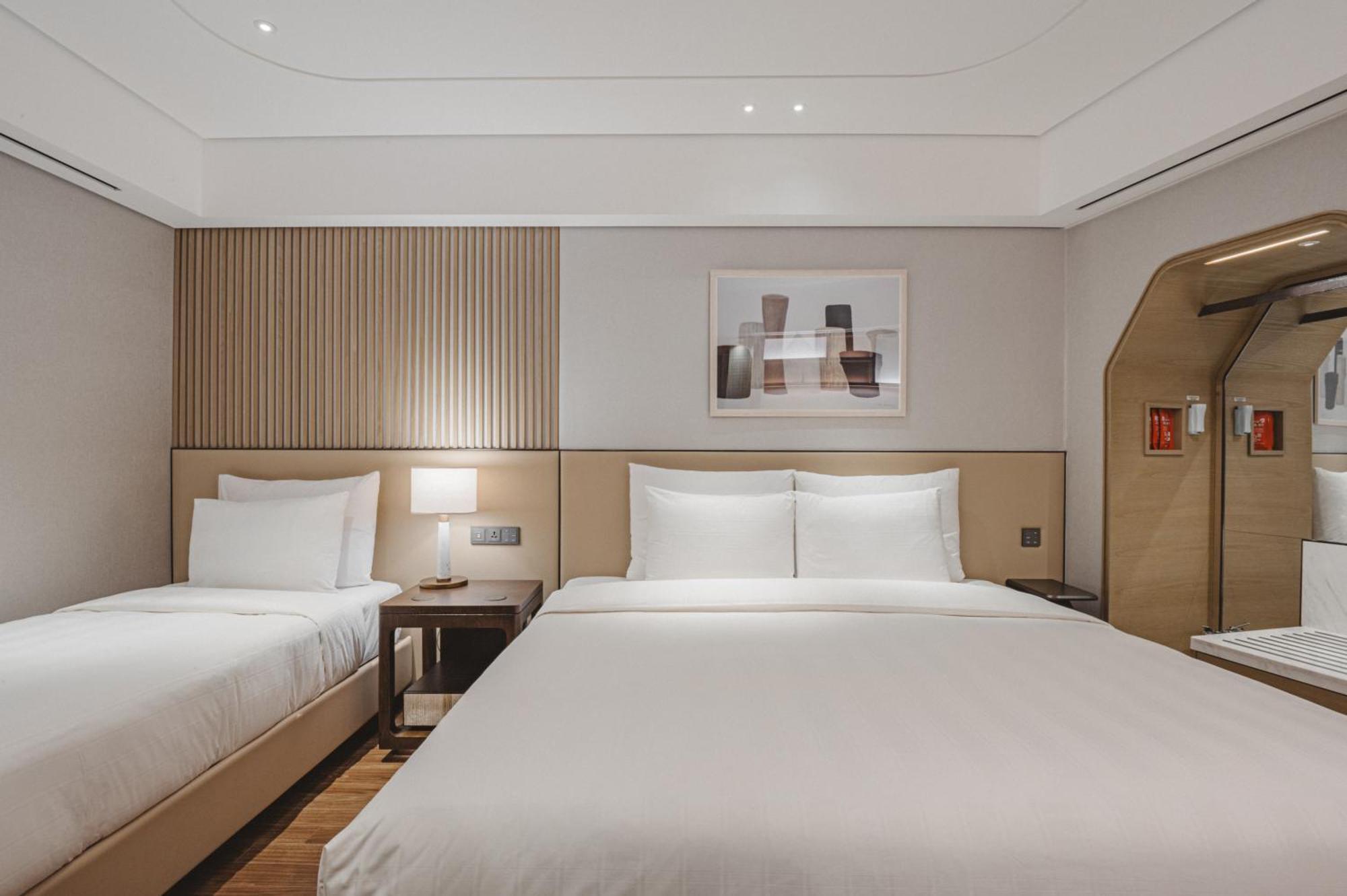 Lotte Hotel World Seoul Exterior photo Deluxe Room